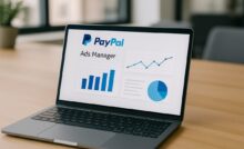 Interfaz de Ads Manager de PayPal en una laptop, con estadísticas y gráficas visibles