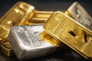 Oro y plata caen ante dólar fuerte y tensiones entre Estados Unidos e Irán en mercados globales