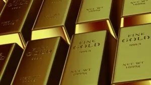 oro alcanza máximos de dos semanas impulsado por caída del dólar y expectativas de paz entre Estados Unidos e Irán