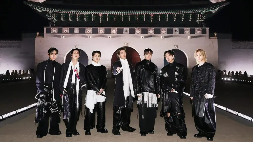 BTS durante una presentación que simboliza el regreso del grupo y el impacto económico del K-pop.